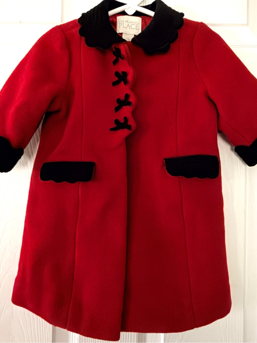 The Children's Place Red Coat with Black Trim and Bow Details